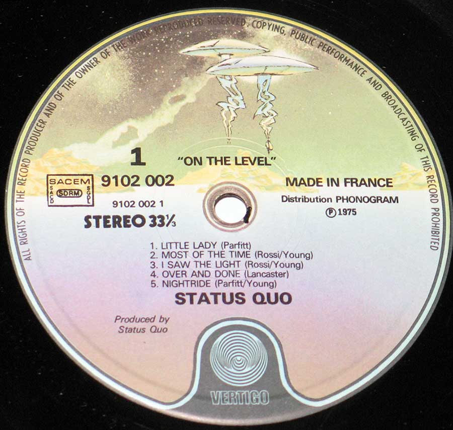 Close up of record's label STATUS QUO - On the Level Vertigo France 12" Vinyl LP Album Side One