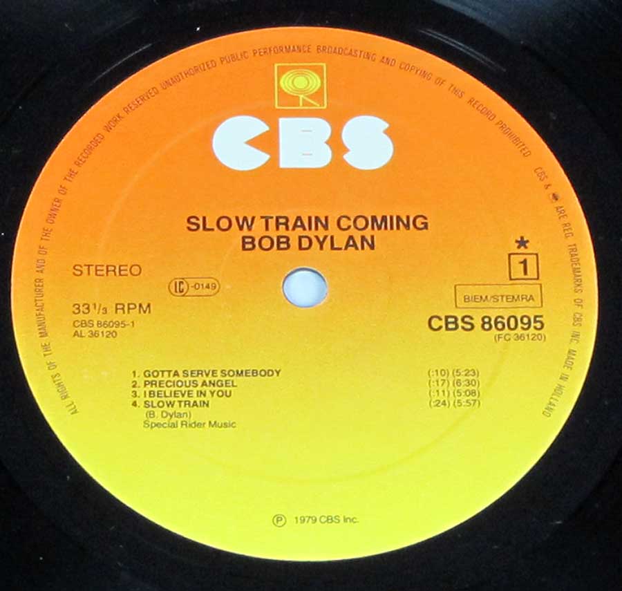 "Slow Train Coming" Record Label Details: Orange to Yellow Colour CBS 86095 ℗ 1979 CBS Inc Sound Copyright 