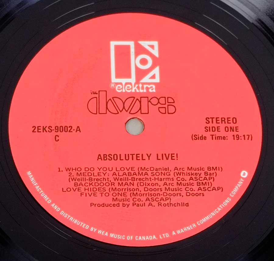 Close up of record's label THE DOORS  - Absolutely Live 2Lp Red Label Side One