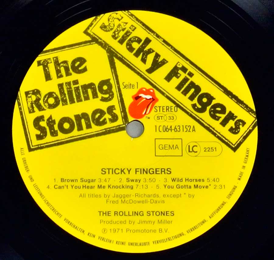 Close up of record's label ROLLING STONES - Sticky Fingers Real Working Zipper Germany Release Side One