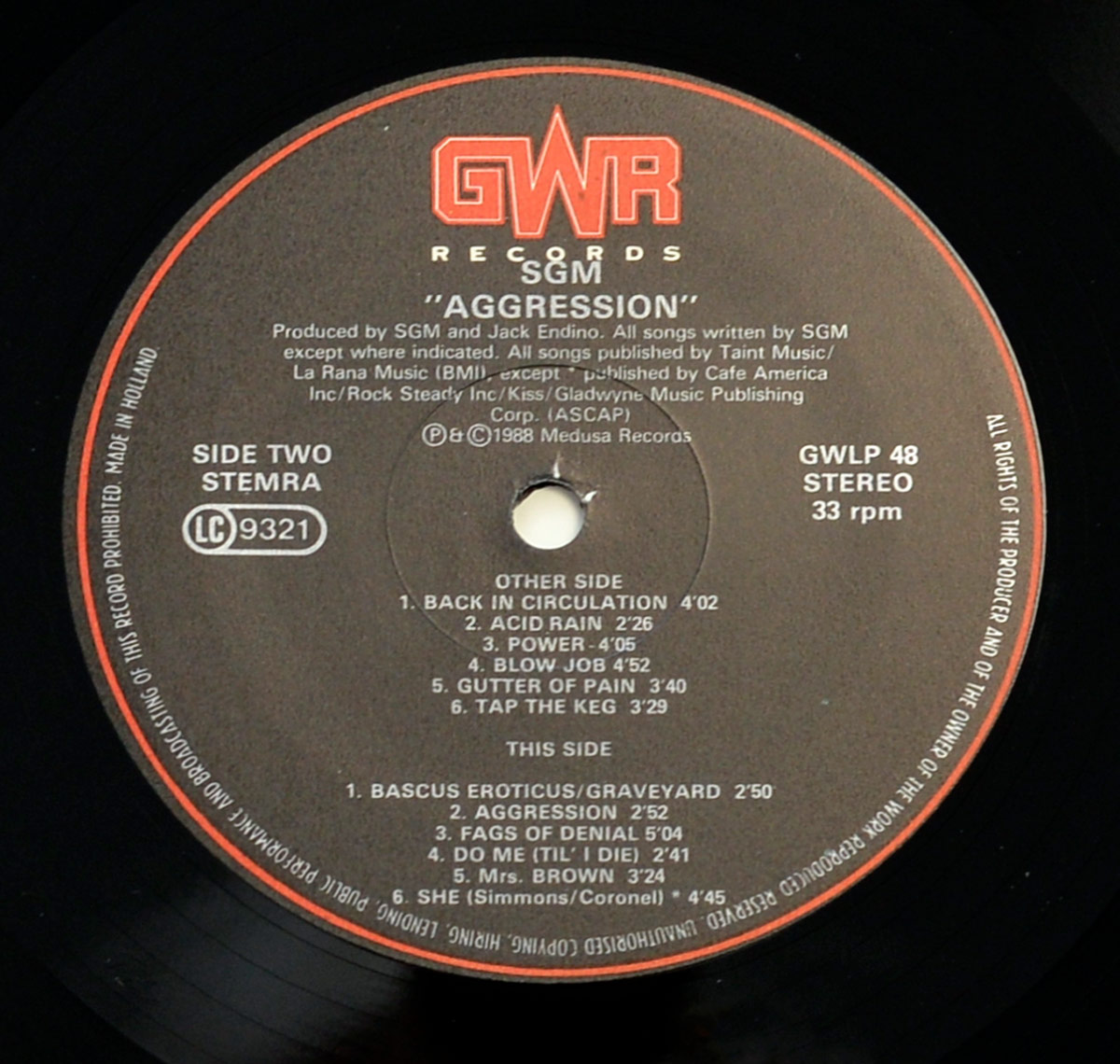 SGM Aggression 12 inch vinyl LP, Side B label. GWR Records logo with tracklist for both sides, production credits, publishing info, and catalog number GWLP 48.