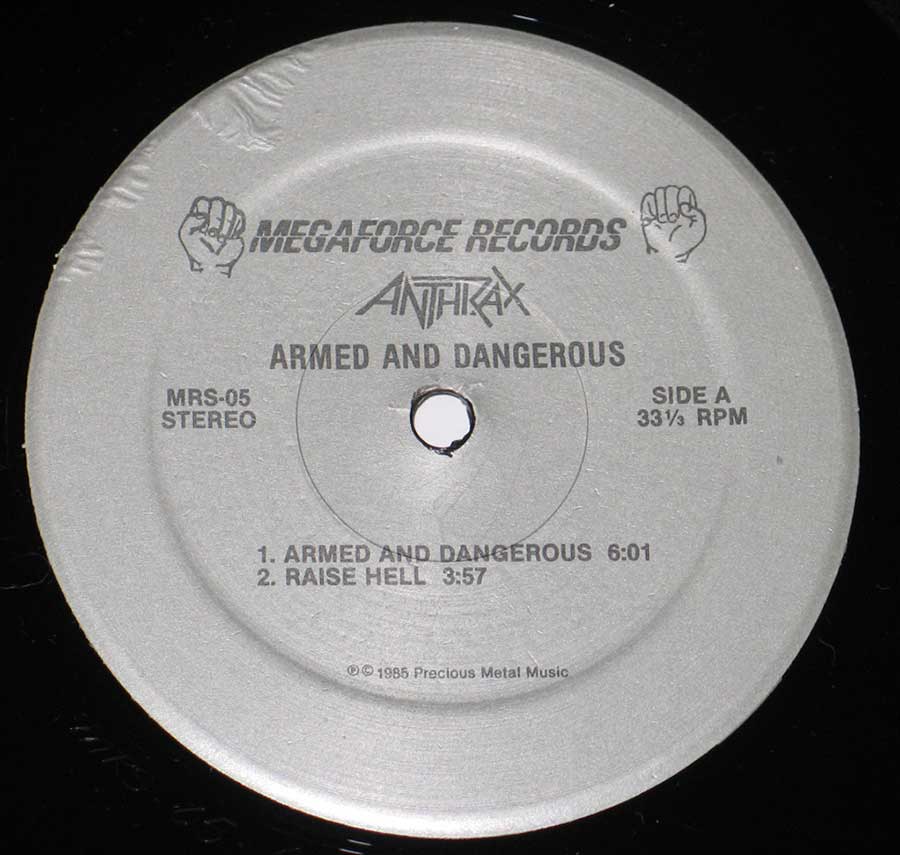 Close-up photo of record label of Armed and Dangerous