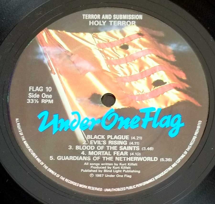 Close up of record's label HOLY TERROR - Terror and Submission ( Made in UK ) Side One