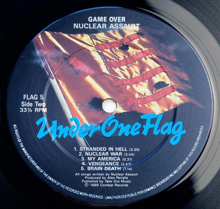 Close up of record's label NUCLEAR ASSAULT - Game Over ( England Pressing ) Side Two