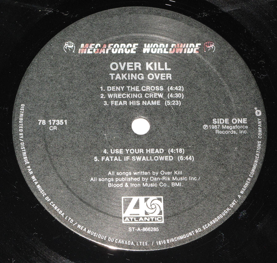 "Taking Over" Black Colour Megaforce Record Label Details: Megaforce Worldwide 78 17351 ℗ 1987 Megaforce Records Inc, Sound Copyright 