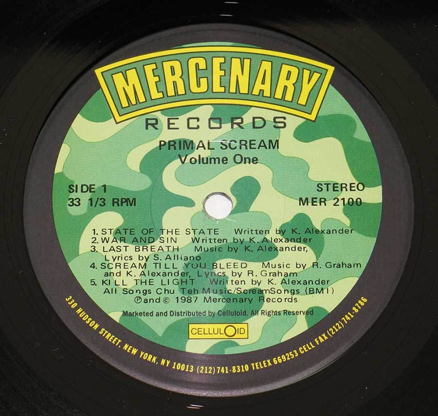 Close up of record's label PRIMAL SCREAM - Volume One Mercenary Records 12" Vinyl LP Album Side One