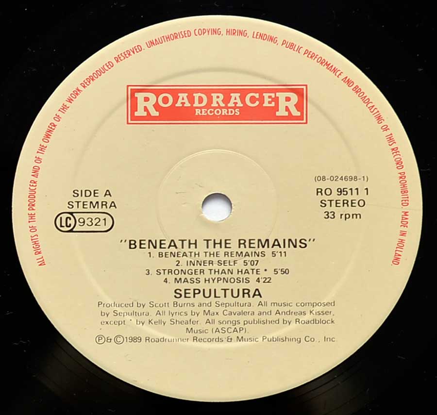 Close up of "Beneath The Remains" Record Label Details: RoadRacer Records RO 9511 1 