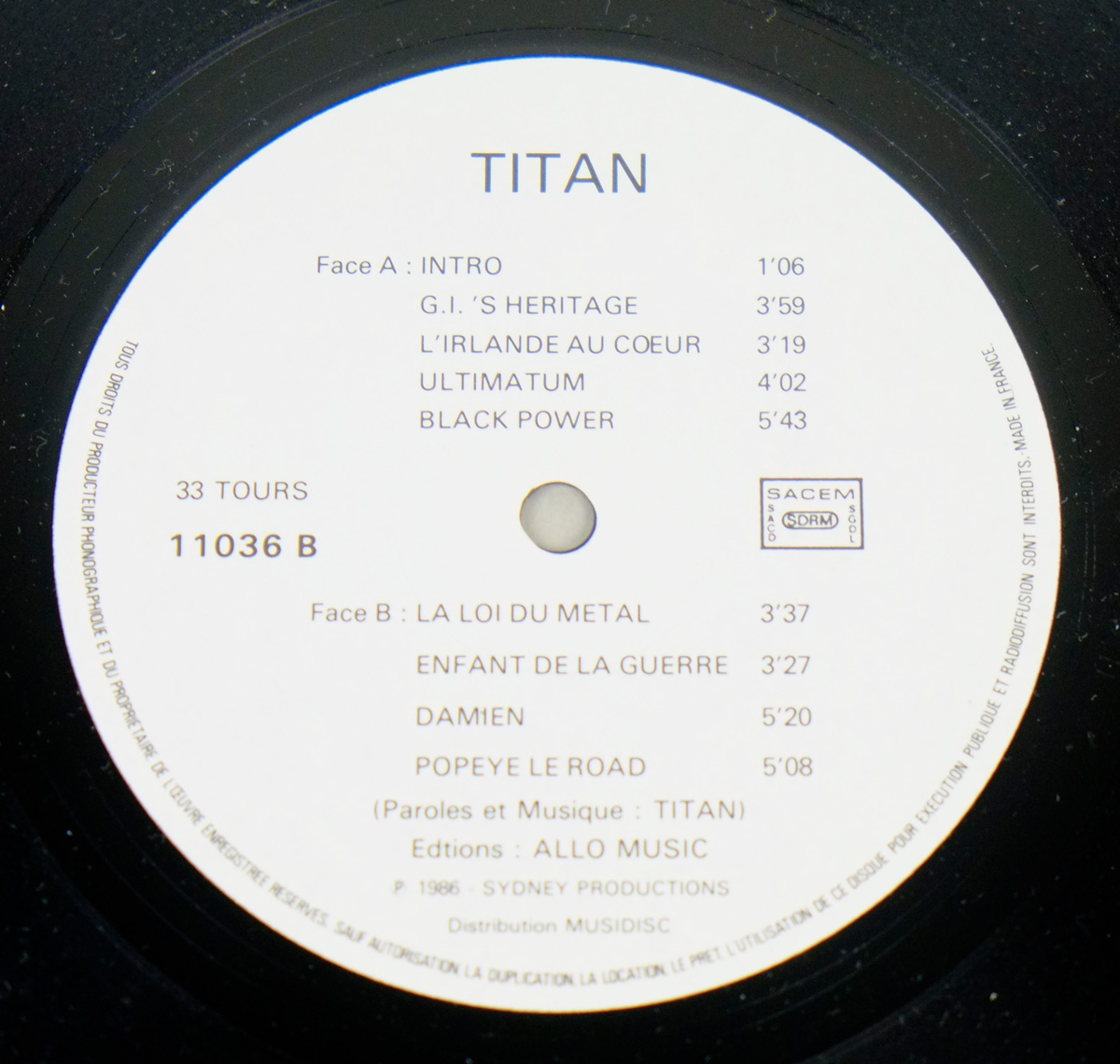 Close up of record's label TITAN - Self-Titled OIS France Speed Metal 12" LP Vinyl Album Side Two