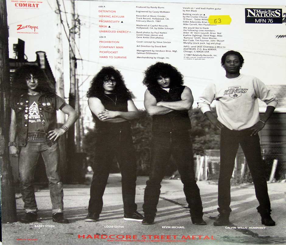 Photo Of The Zoetrope Band-Members On The Back Cover  Photo Of "Zoetrope - A Life Of Crime" Album 