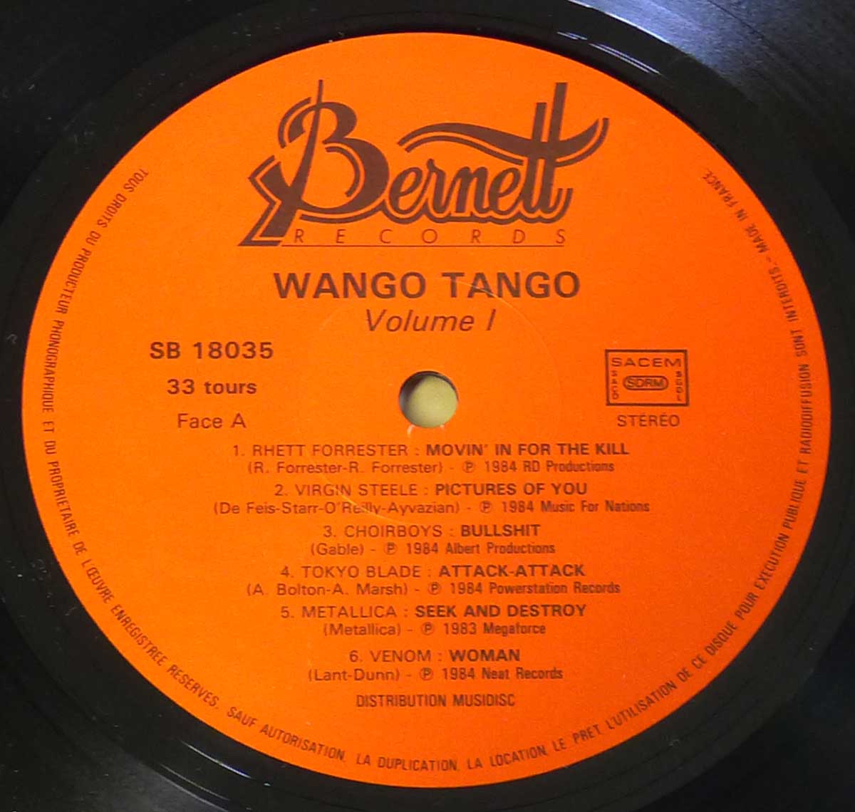 Close-up Photo of "Wango Tango Vol 1." Record Label 